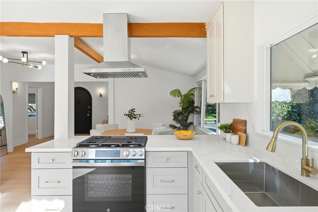 829 North Valley Street Burbank, CA 91505 - Photo 22 of 58 a kitchen with a sink a stove and cabinets