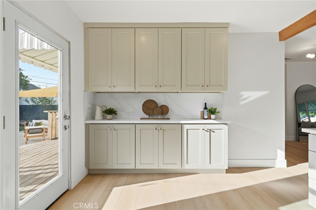 829 North Valley Street Burbank, CA 91505 - Photo 24 of 58 a white cabinet sitting in a kitchen