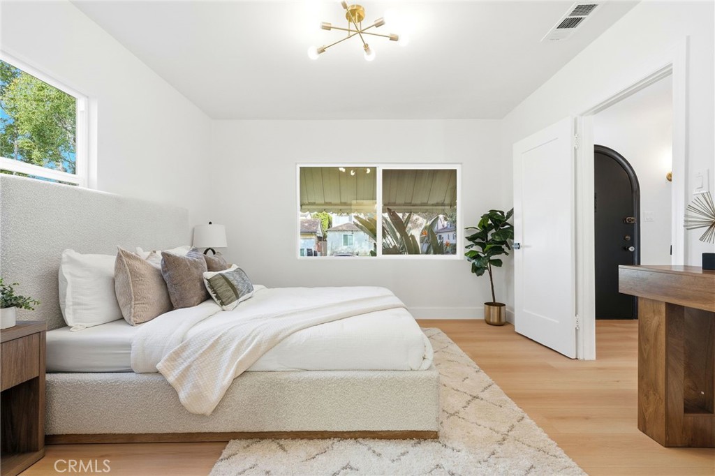 829 North Valley Street Burbank, CA 91505 - Photo 27 of 58 a bedroom with a large bed and a window