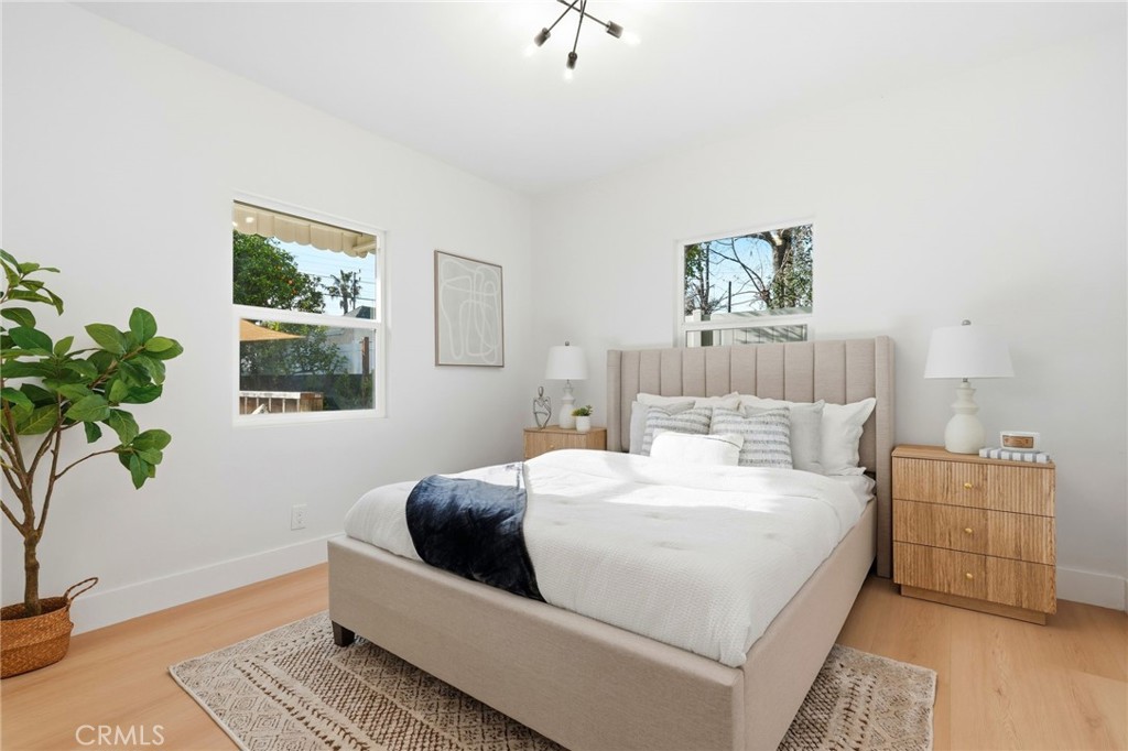829 North Valley Street Burbank, CA 91505 - Photo 33 of 58 a bedroom with a bed and a window