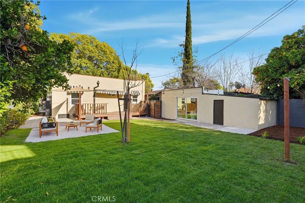 829 North Valley Street Burbank, CA 91505 - Photo 37 of 58 a backyard of a house with table and chairs