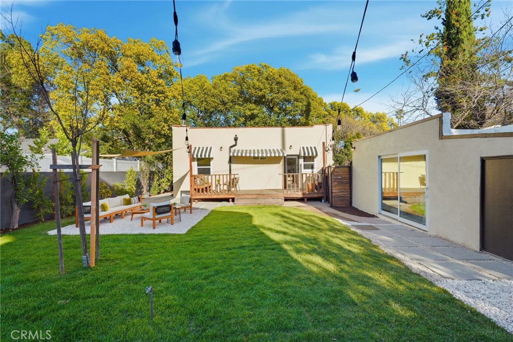 829 North Valley Street Burbank, CA 91505 - Photo 43 of 58 a view of a backyard with couches chair and a fire pit