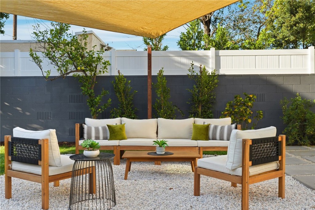 829 North Valley Street Burbank, CA 91505 - Photo 46 of 58 a outdoor sitting area with couch and a potted plant