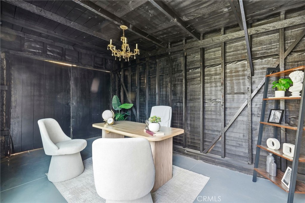 829 North Valley Street Burbank, CA 91505 - Photo 48 of 58 a dining room with furniture and a chandelier