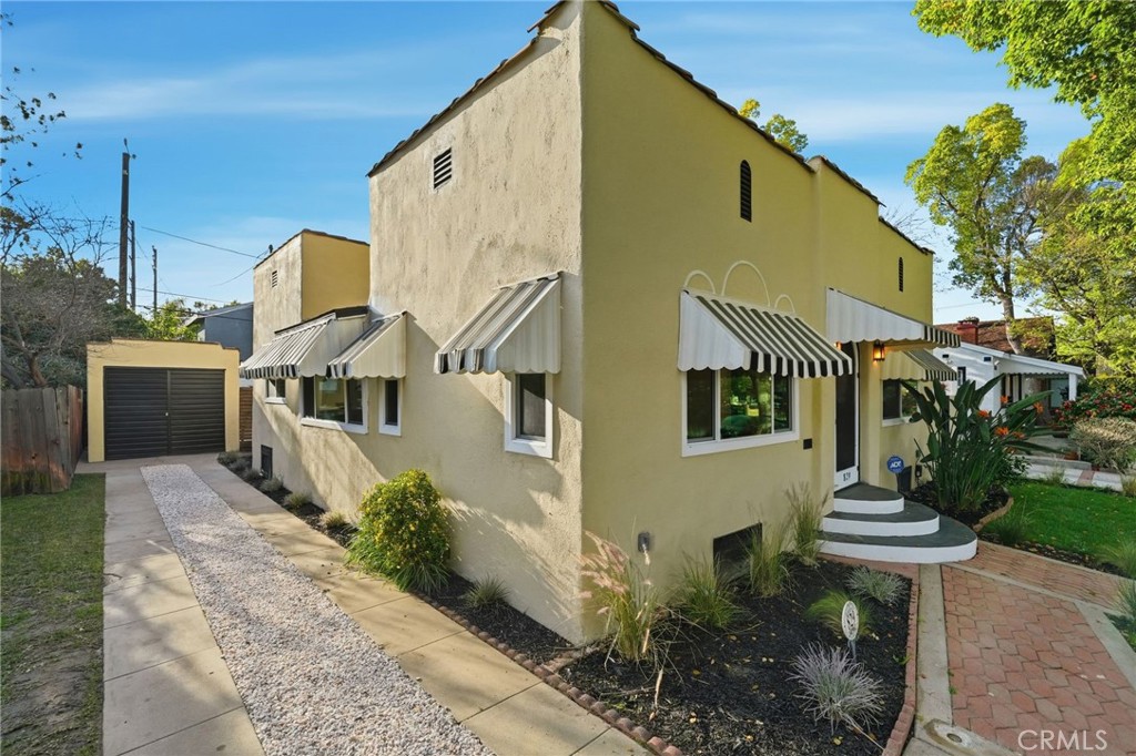 829 North Valley Street Burbank, CA 91505 - Photo 50 of 58 a view of a house with backyard and sitting area