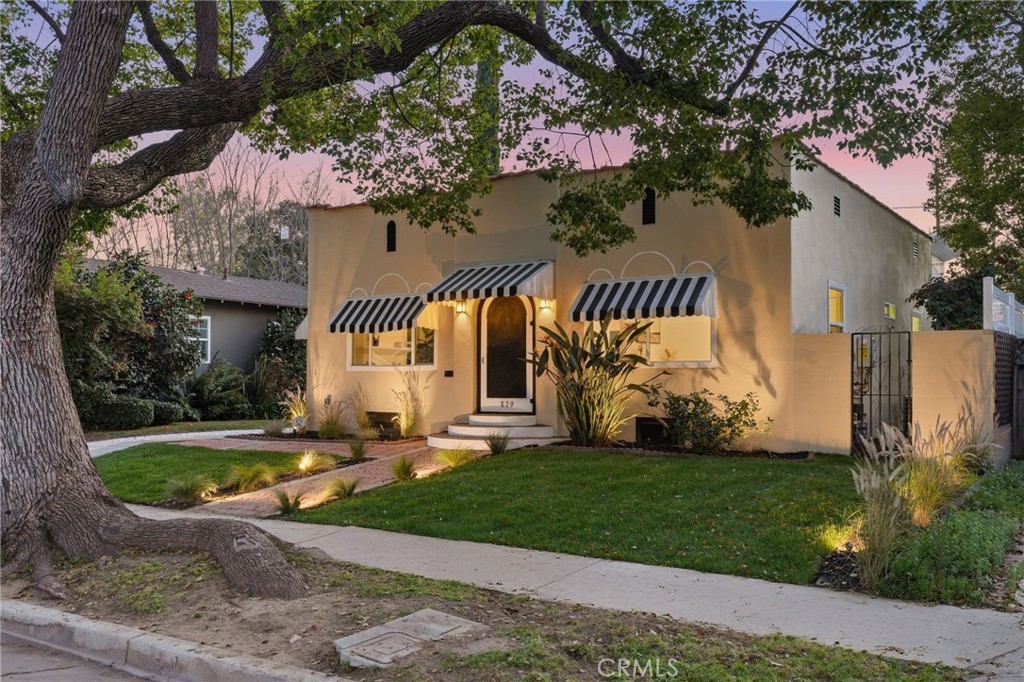 829 North Valley Street Burbank, CA 91505 - Photo 7 of 58 a front view of house with yard and green space