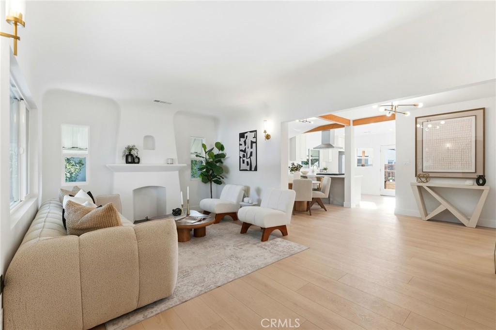 829 North Valley Street Burbank, CA 91505 - Photo 9 of 58 a living room with furniture or wooden floor and a large window