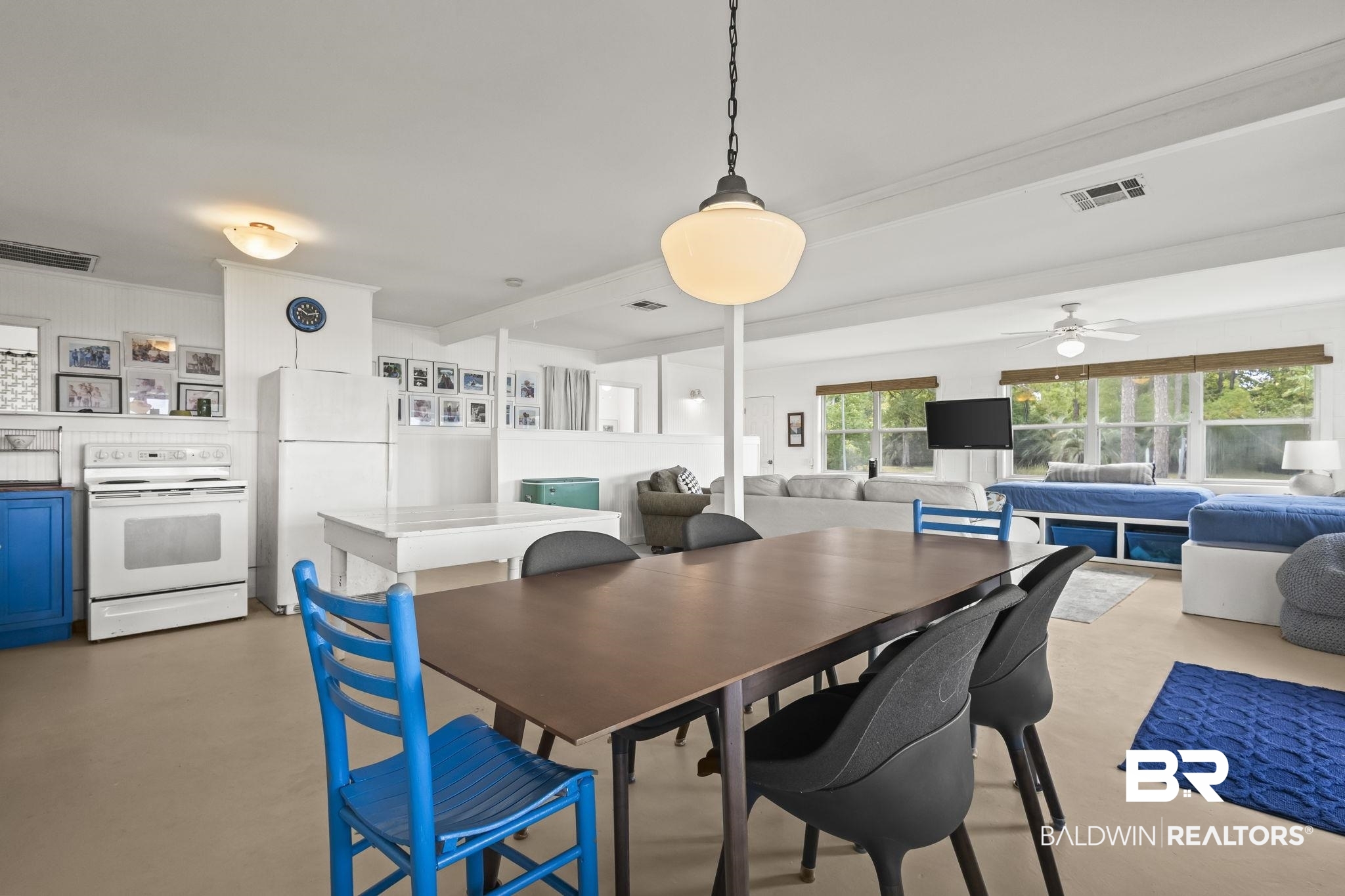 7849 Bayshore Drive Elberta, AL 36530 - Photo 18 of 47 Dining area featuring ceiling fan and concrete floors