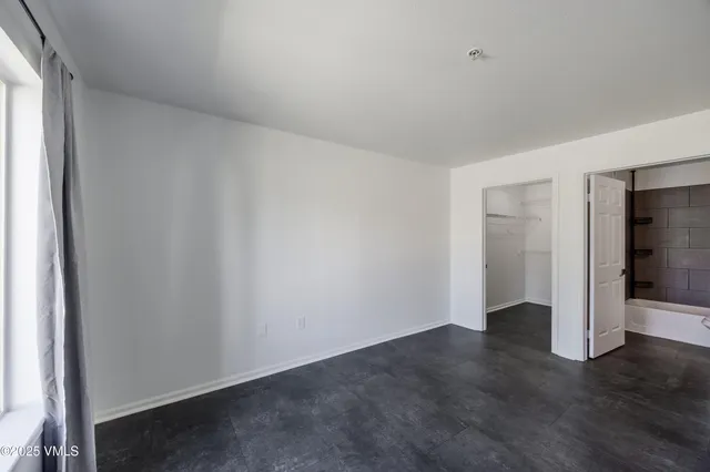 a bathroom with a sink a toilet and bathtub