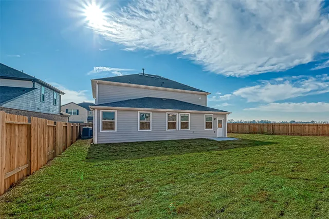 a house view with a garden space