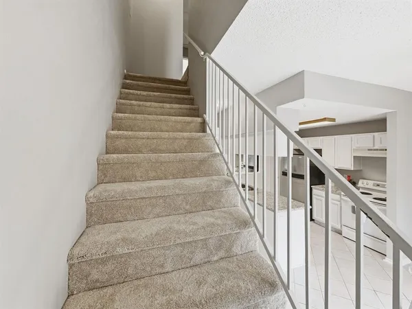 $270,000 | 214 Samuel Boulevard, Unit 1H, Coppell, TX 75019