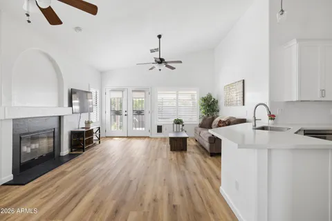 a large kitchen with sink a refrigerator and a stove