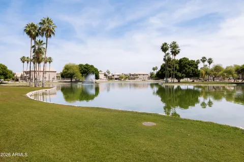 a view of a lake with a big yard