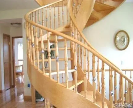 a view of staircase with large windows
