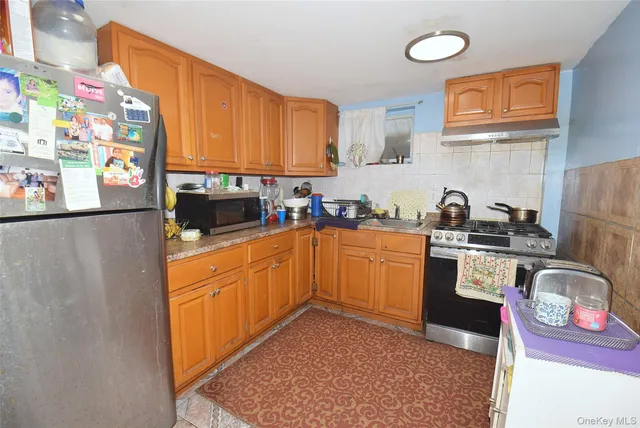 a balcony with wooden floor and fence
