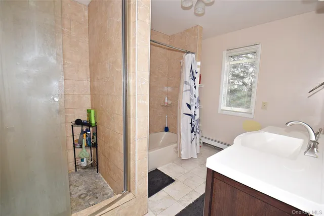 a front view of a house with a yard table and chairs