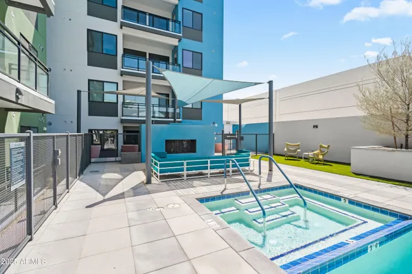 a view of a building with outdoor seating