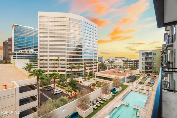 a utility room with sink dryer and washer