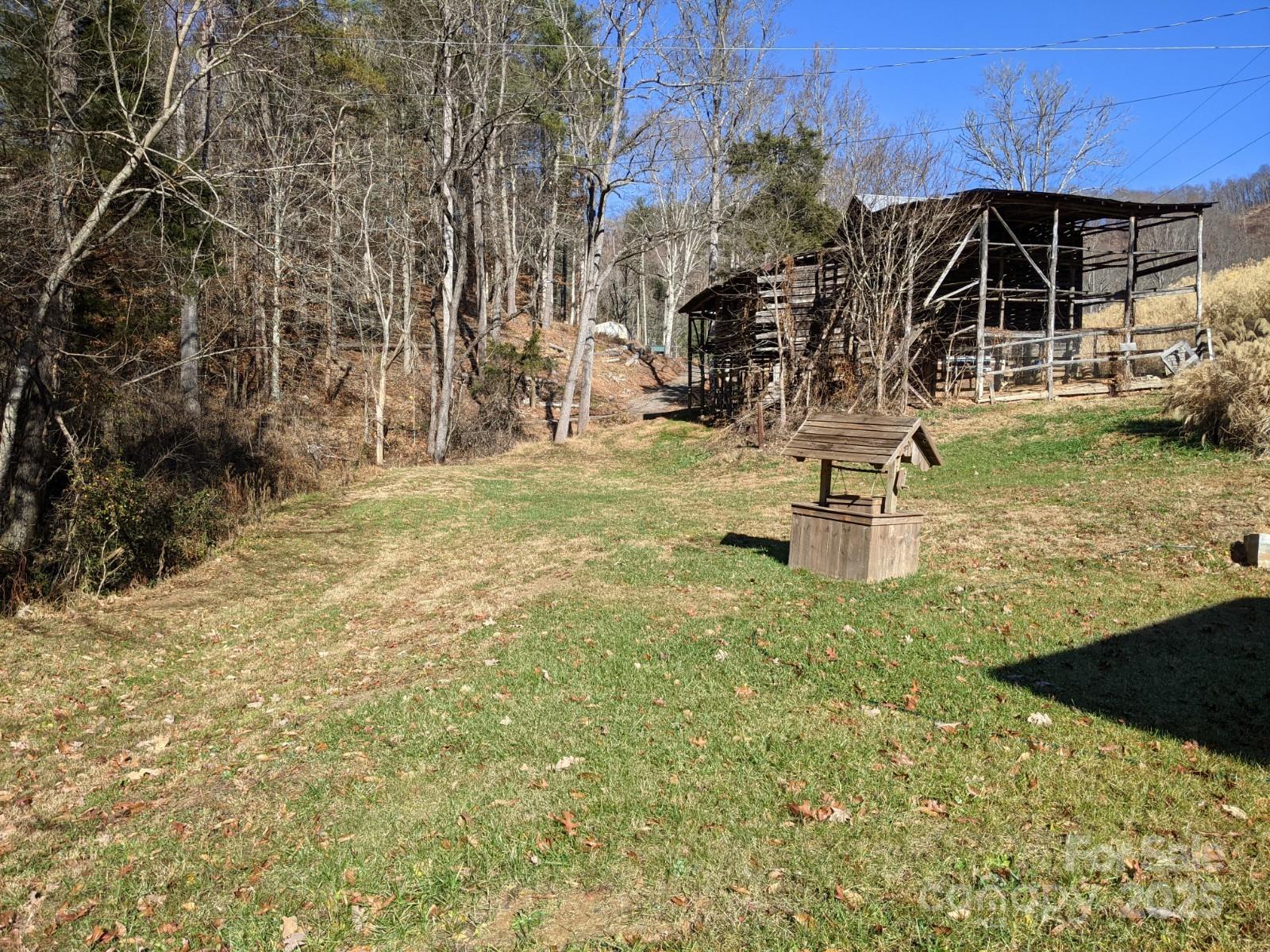 196 McKinney Road Weaverville, NC 28787 - Photo 17 of 20 a view of a park with swings