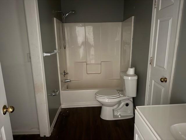 2196 Stenger Road Douglasville, GA 30135 - Photo 8 of 13 a white toilet sitting next to a bathroom sink and tub
