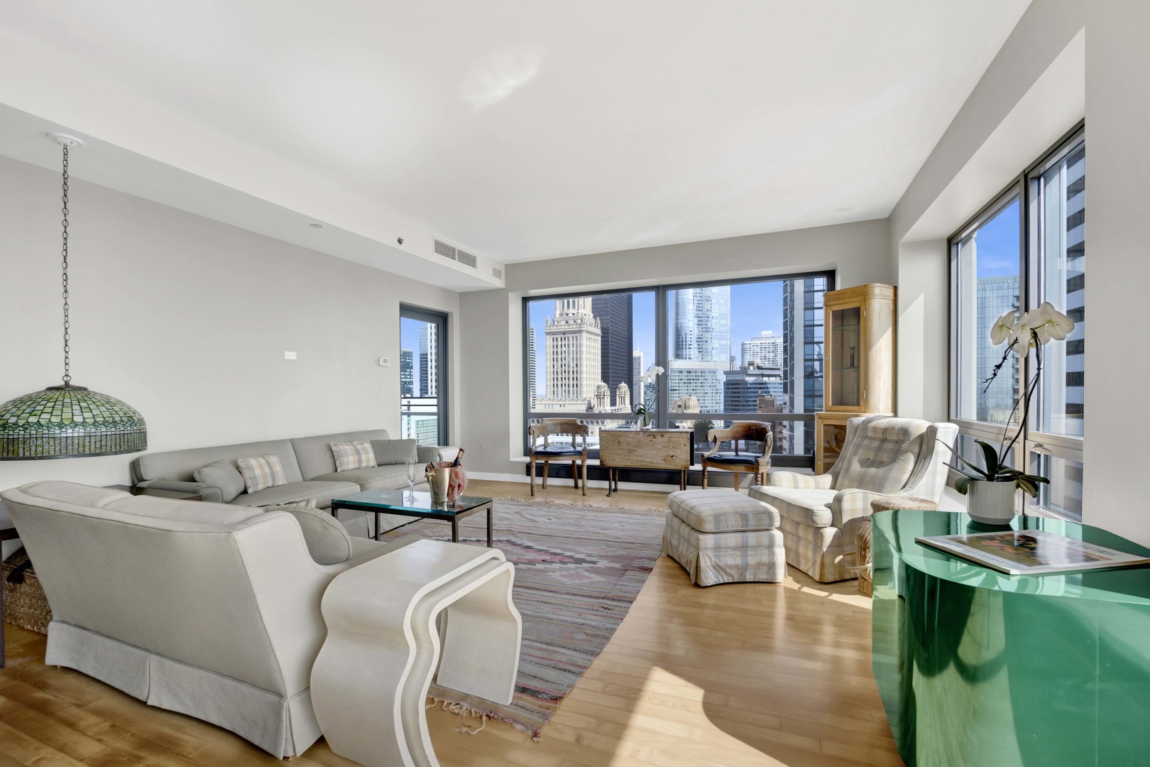 130 North Garland Court, Unit 3001 Chicago, IL 60602 - Photo 15 of 63 a living room with furniture and a large window