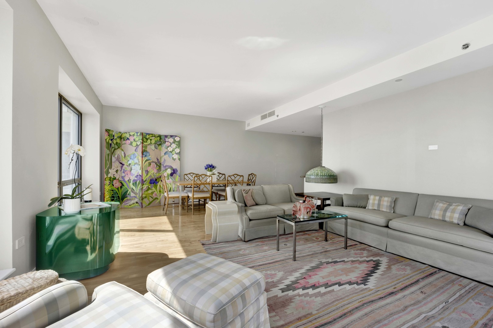 130 North Garland Court, Unit 3001 Chicago, IL 60602 - Photo 16 of 63 a living room with furniture and a large window