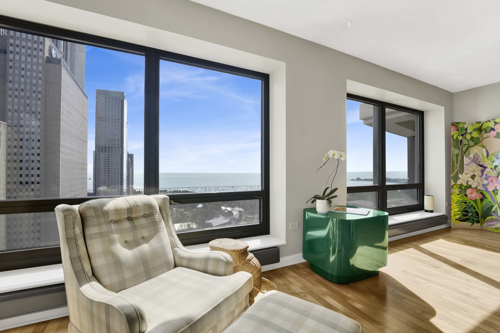 130 North Garland Court, Unit 3001 Chicago, IL 60602 - Photo 17 of 63 a living room with furniture a window and a fireplace