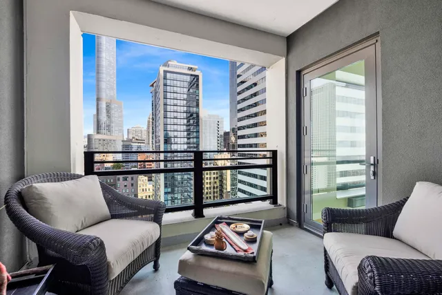 a view of a city with tall buildings