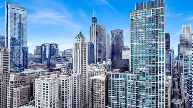 a view of city with tall buildings
