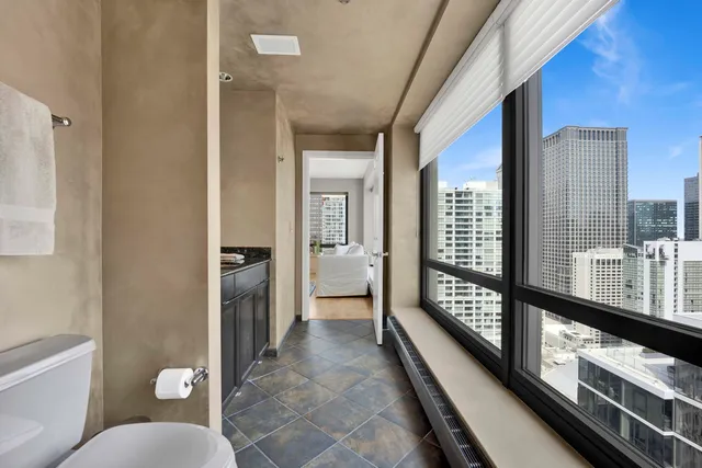 a bedroom with a bed and a cabinets