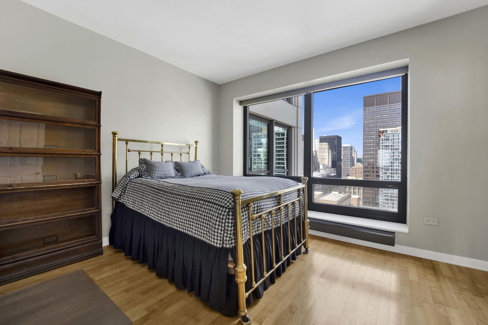 130 North Garland Court, Unit 3001 Chicago, IL 60602 - Photo 33 of 63 a bedroom with a bed and large window