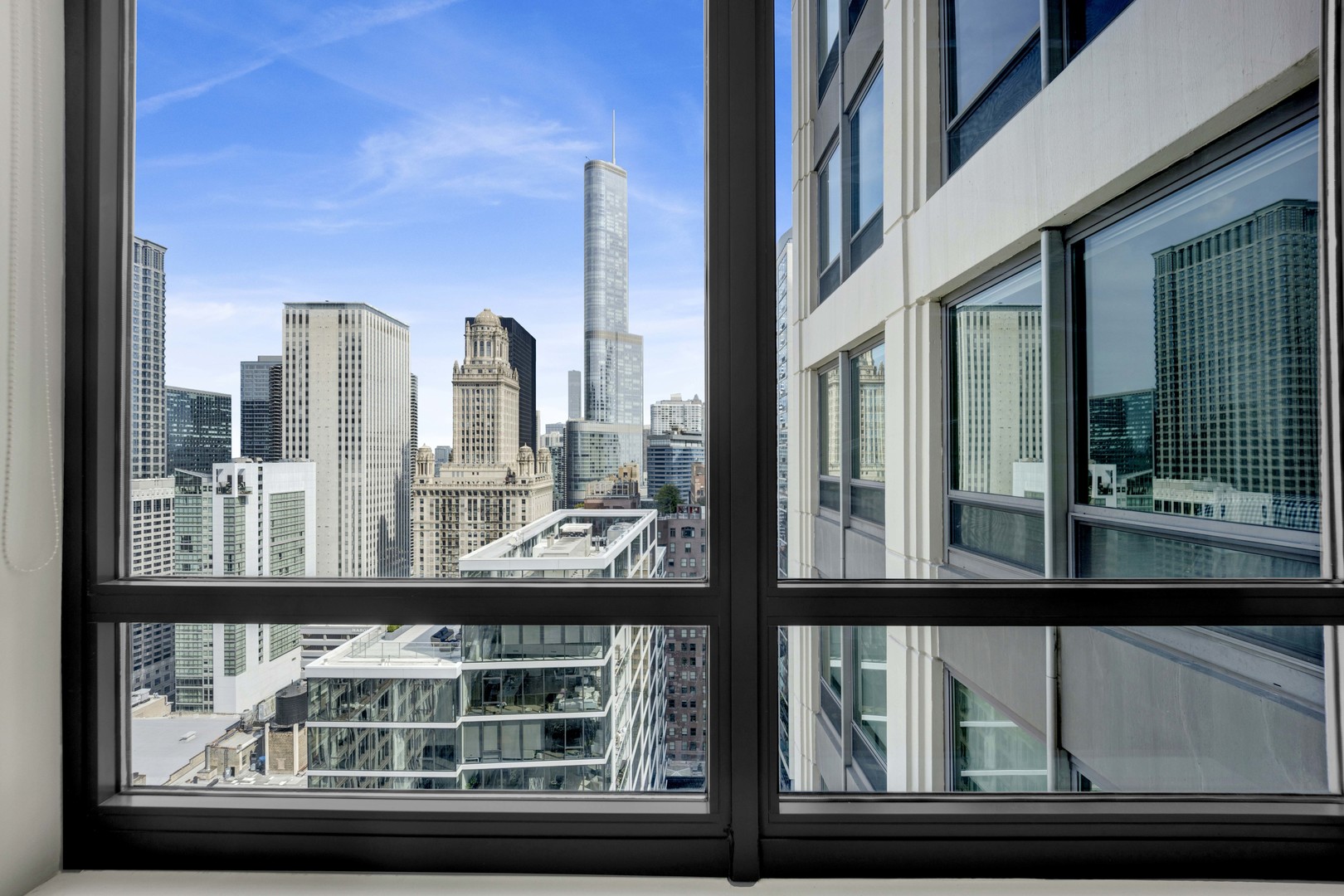 130 North Garland Court, Unit 3001 Chicago, IL 60602 - Photo 40 of 63 a view of a large building from a window