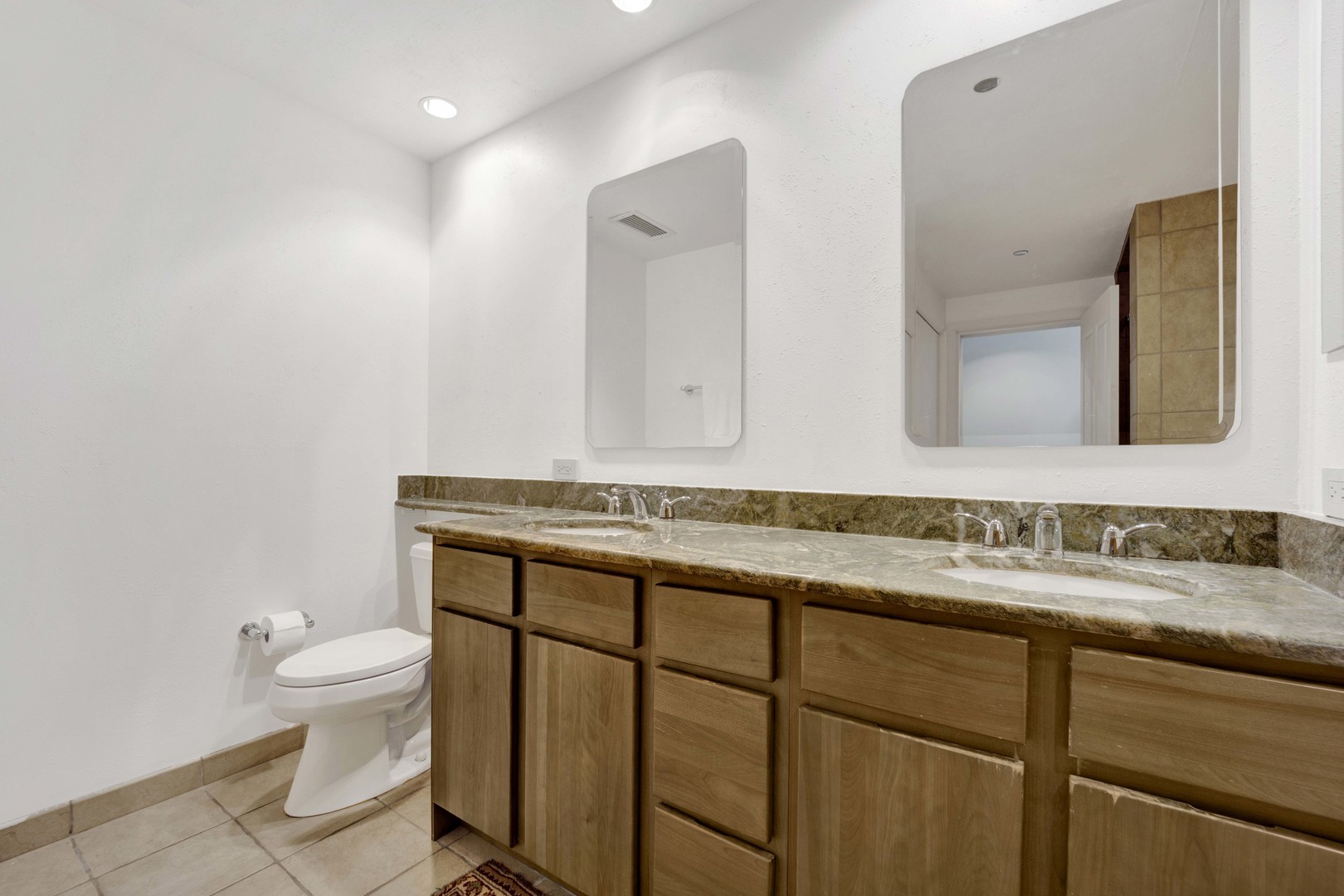 130 North Garland Court, Unit 3001 Chicago, IL 60602 - Photo 43 of 63 a bathroom with a sink and a toilet