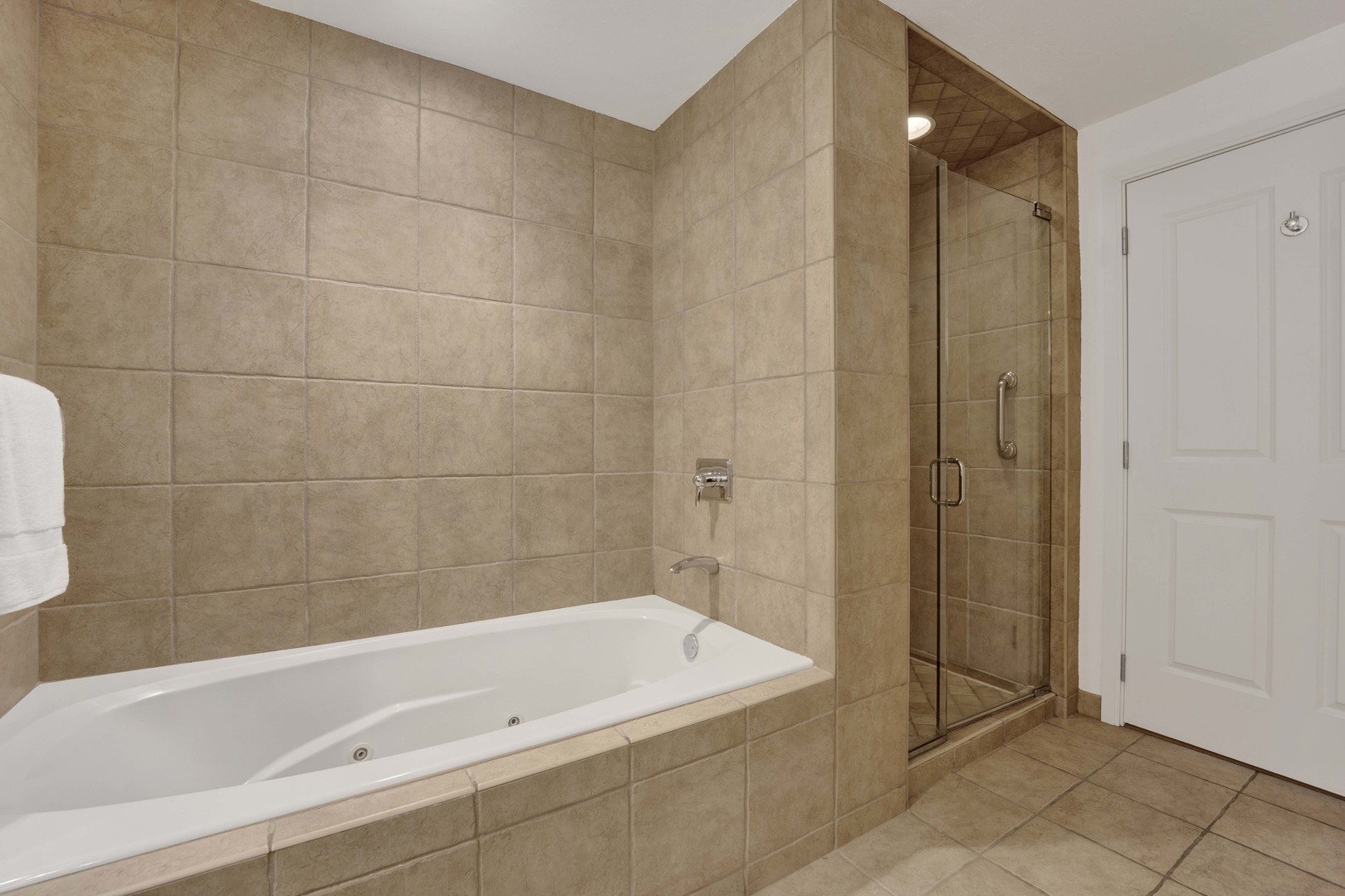 130 North Garland Court, Unit 3001 Chicago, IL 60602 - Photo 44 of 63 a bathroom with a bathtub and a shower