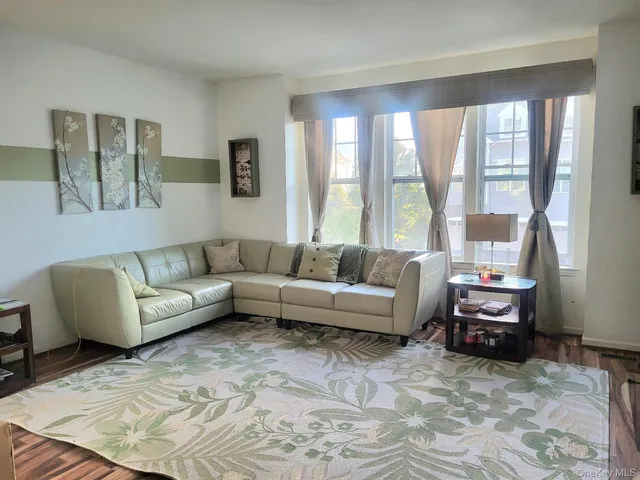 a kitchen with stainless steel appliances granite countertop a sink and a stove