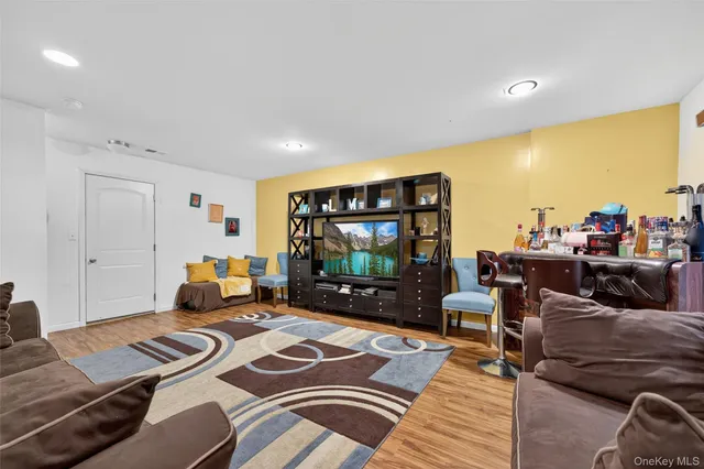 a view of a field of grass and trees