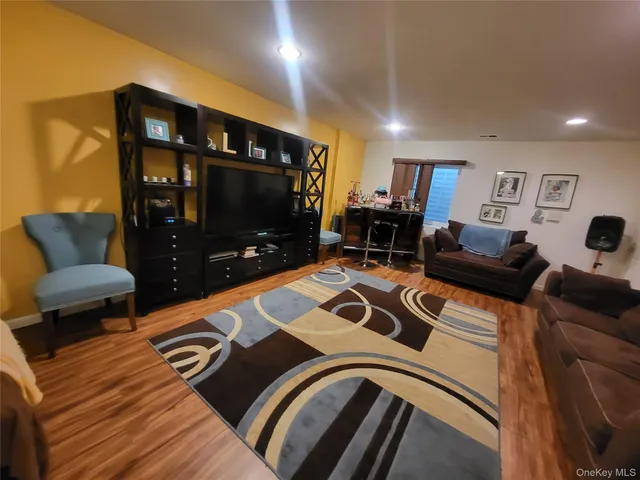 a view of a two chairs in the balcony