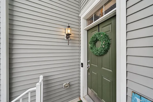 a view of a door and a window