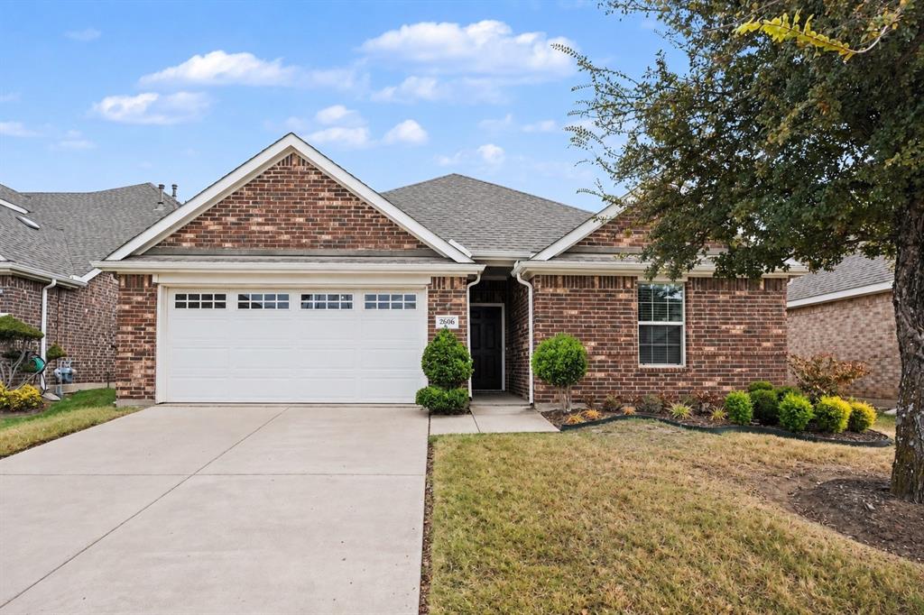 2606 Middleton Road Glenn Heights, TX 75154 - Photo 1 of 18 Brick exterior with a gabled roofline