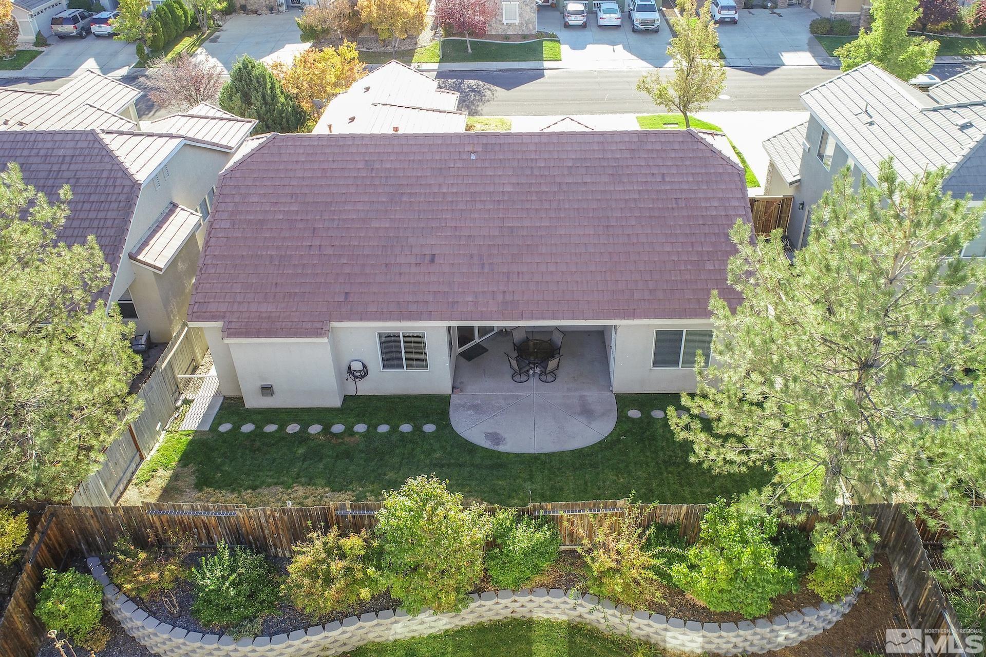 10421 Silver Rush Court Reno, NV 89521 - Photo 3 of 30 a aerial view of a house with a yard and potted plants