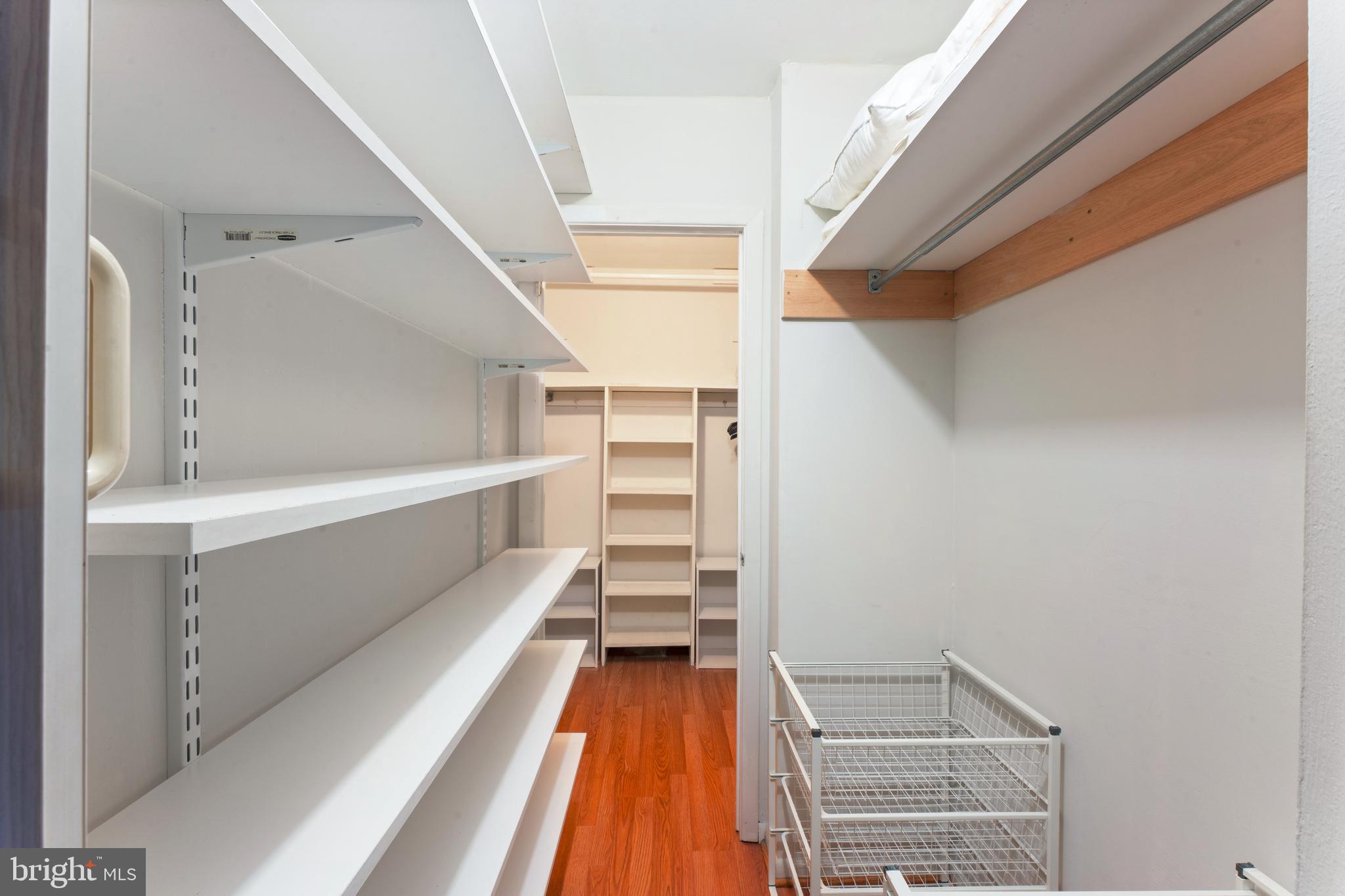 8940 Krewstown Road, Unit 204 Philadelphia, PA 19115 - Photo 18 of 23 a view of walk in closet with empty racks