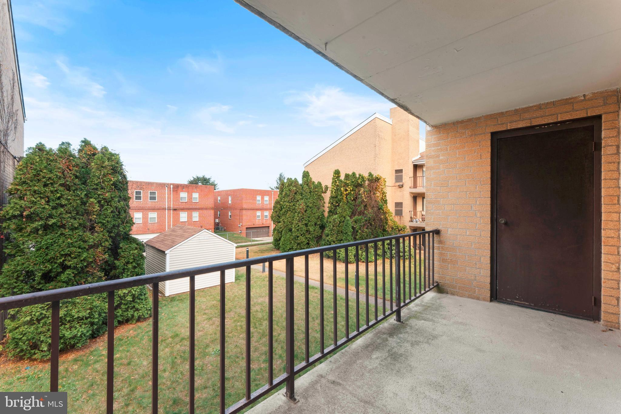 8940 Krewstown Road, Unit 204 Philadelphia, PA 19115 - Photo 23 of 23 a view of city from balcony