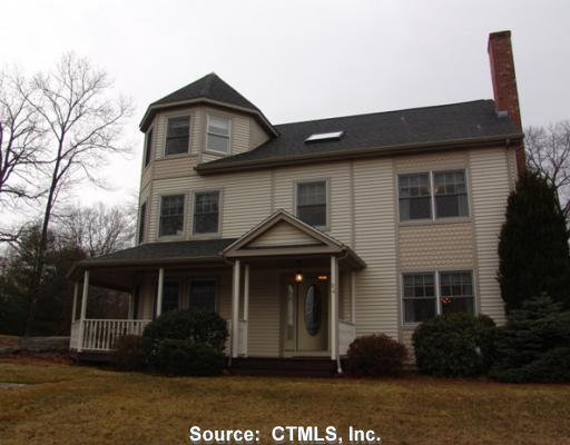94 Lower Road Guilford, CT 06437 - Photo 1 of 1 a front view of a house with a garden