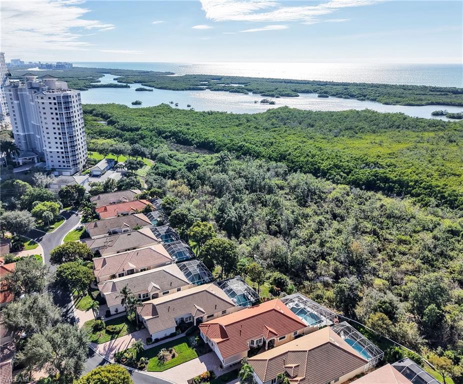 353 Steerforth Court Naples, FL 34110 - Photo 4 of 40 an aerial view of multiple house