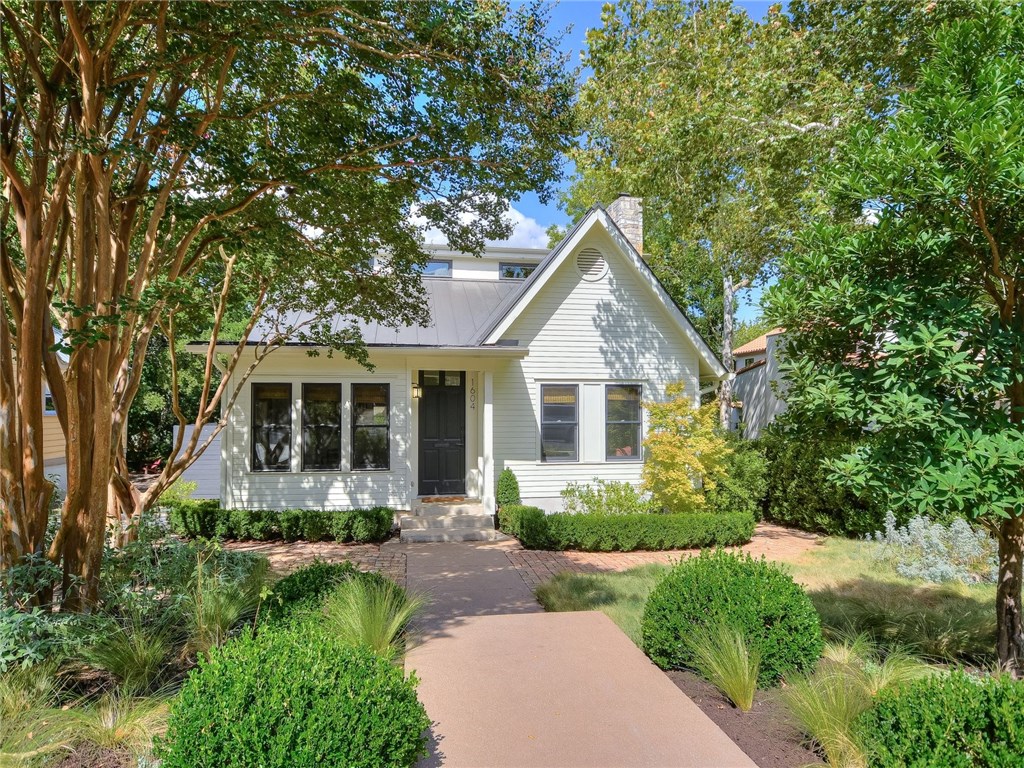 1604 Alta Vista Avenue Austin, TX 78704 - Photo 1 of 1 a front view of house with yard and green space