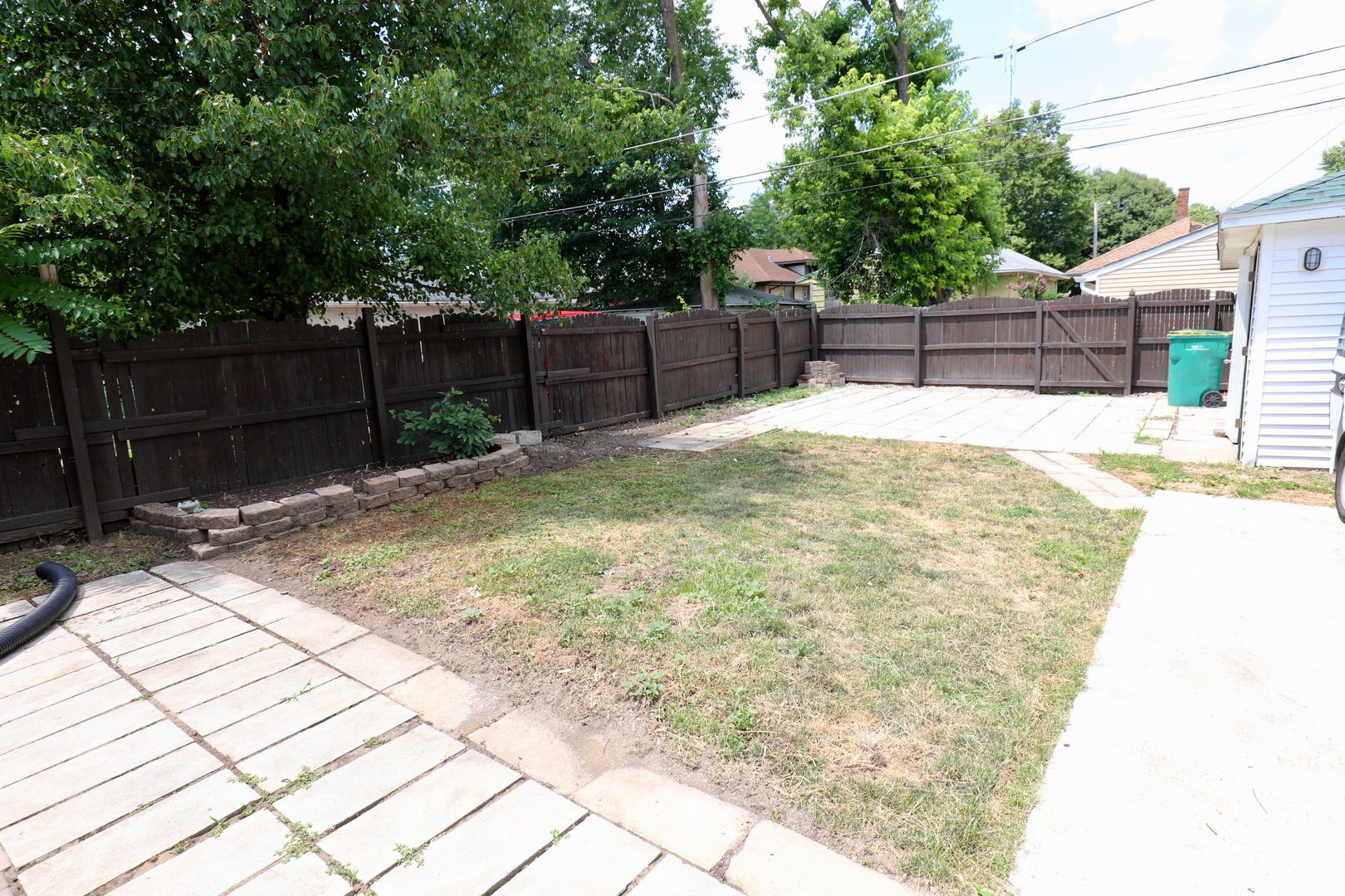 507 Grant Avenue Joliet, IL 60433 - Photo 16 of 16 a view of backyard with wooden fence