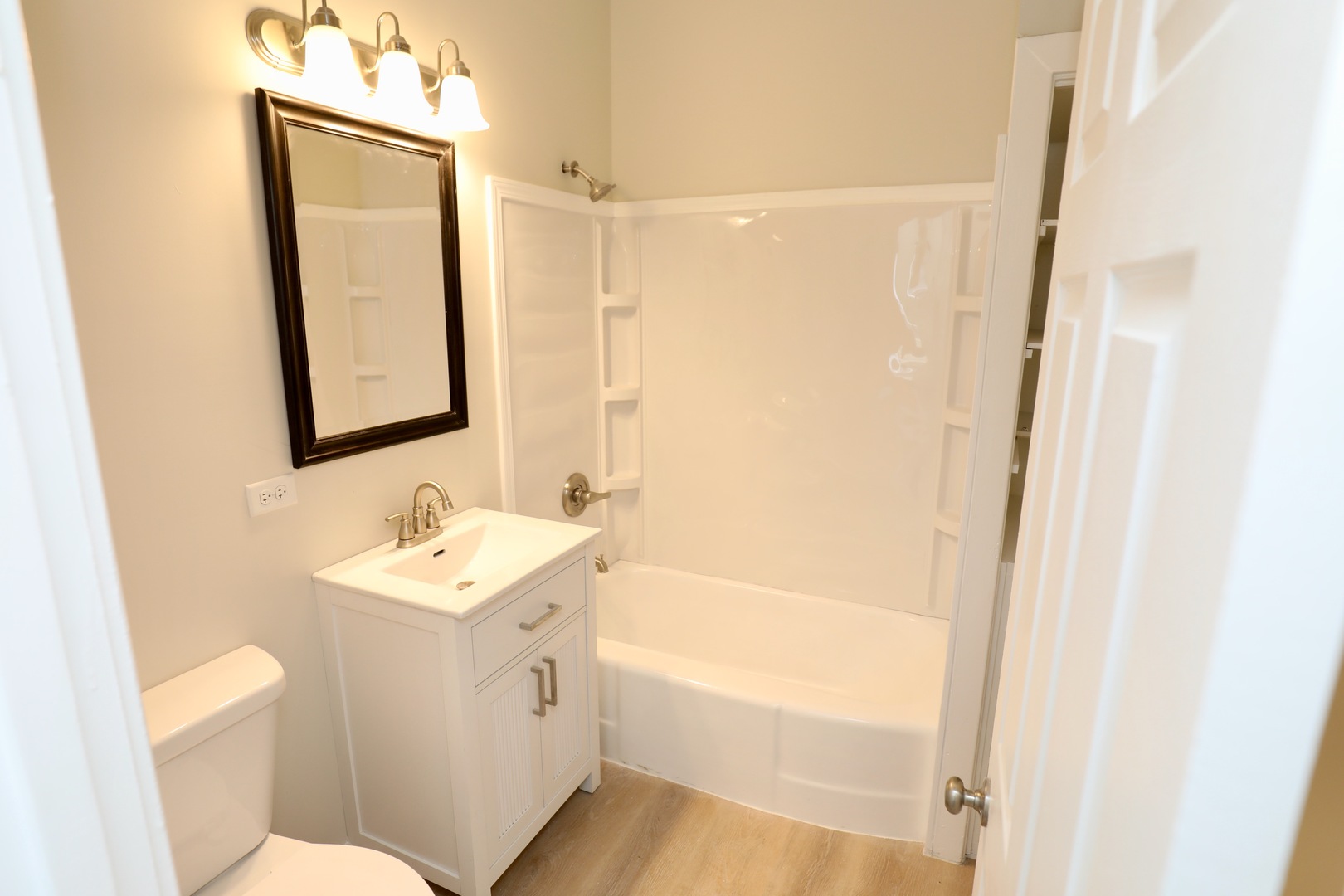 507 Grant Avenue Joliet, IL 60433 - Photo 8 of 16 a bathroom with a sink a toilet and shower