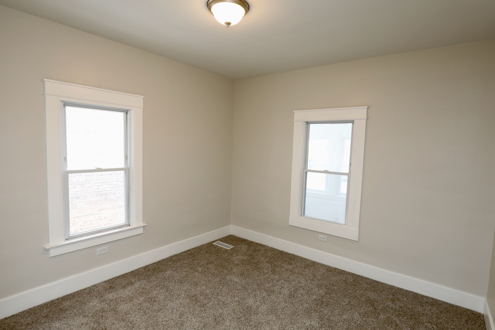 507 Grant Avenue Joliet, IL 60433 - Photo 10 of 16 an empty room with a window