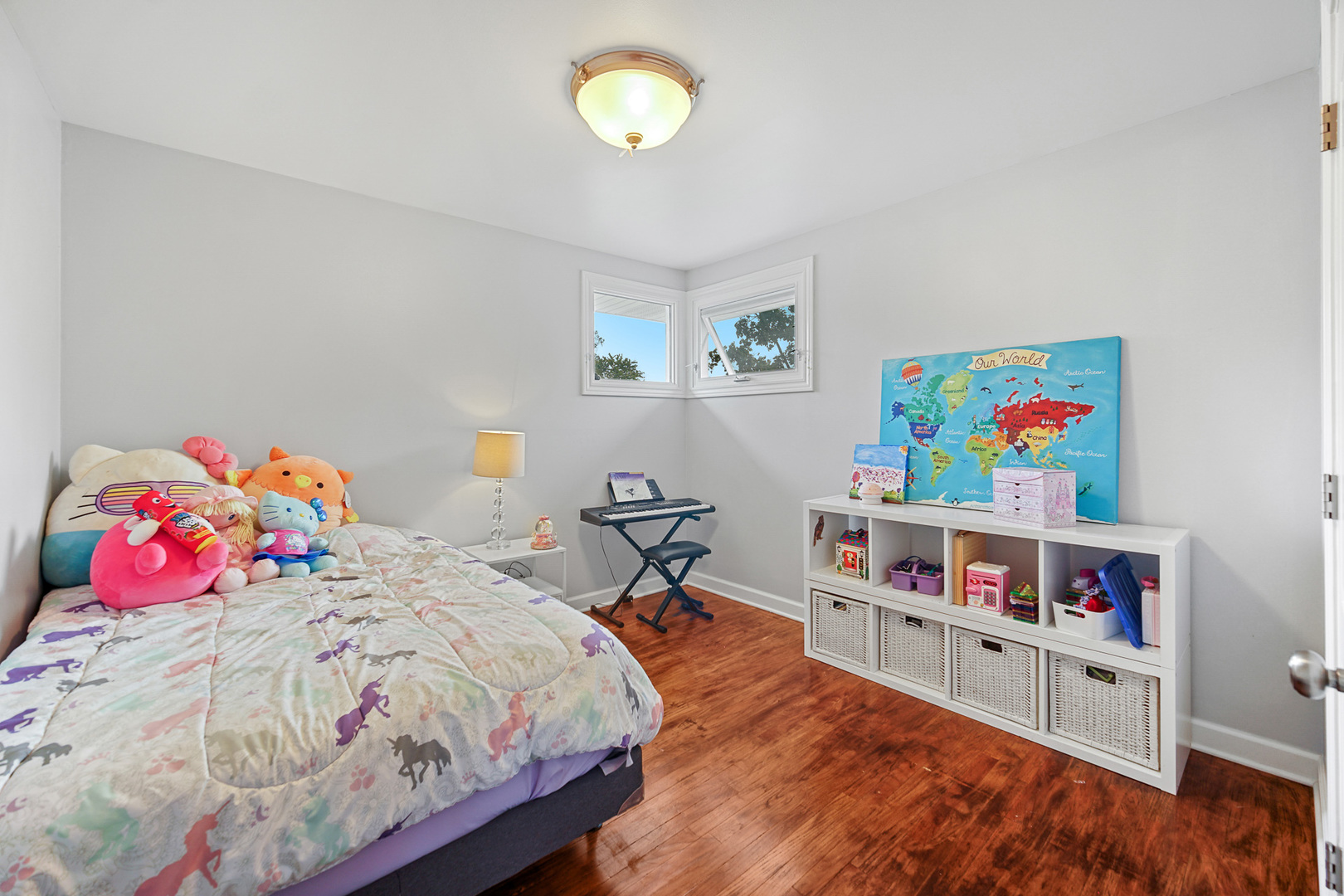 1S550 Nimitz Road Oakbrook Terrace, IL 60181 - Photo 12 of 23 a bedroom with bed and book shelf