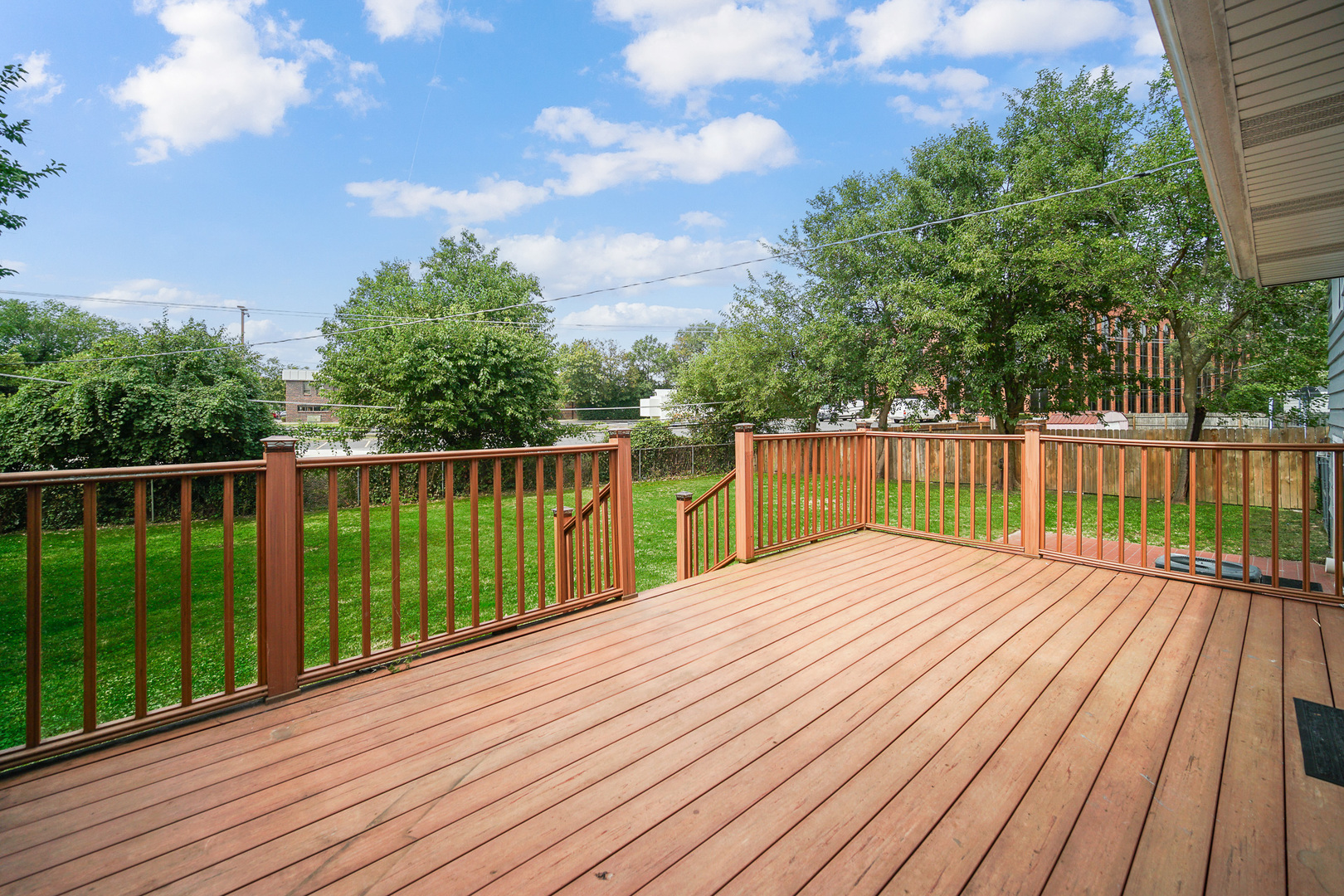 1S550 Nimitz Road Oakbrook Terrace, IL 60181 - Photo 4 of 23 a view of a balcony with wooden floor